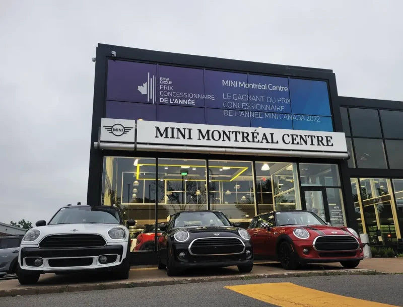 Mini Montreal Building Wrap | Contra Vision Campaign White on Black